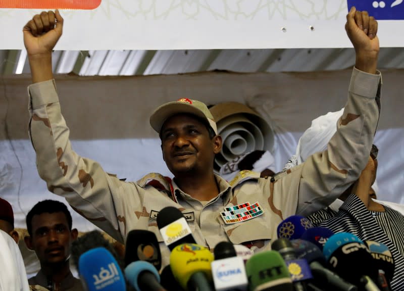 FILE PHOTO: Lieutenant General Mohamed Hamdan Dagalo, deputy head of the military council and head of Sudan's paramilitary Rapid Support Forces, greets his supporters as he attends a meeting in Khartoum