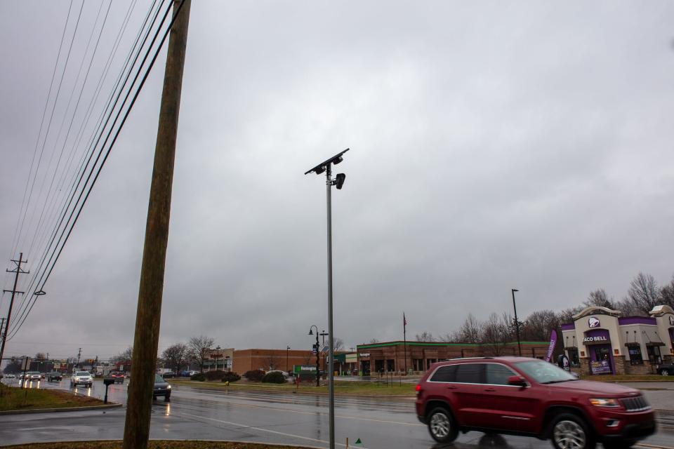 One of four license plate cameras installed at the intersection of Sterns and Secor roads in Bedford Township is pictured Friday.