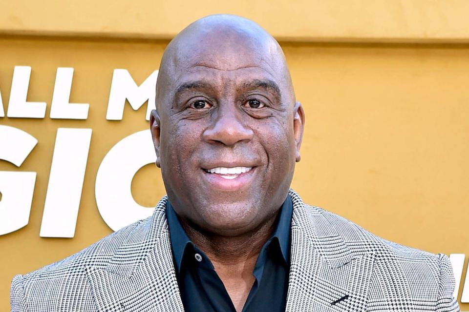 <p>Getty Images</p>  Magic Johnson attends the Los Angeles premiere of Apple