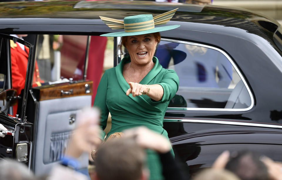 Sarah Ferguson making a face as she exits the car to head to St. George's Chapel.&nbsp;