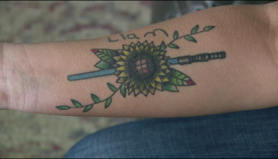 Amelia's tattoo depicting Liam's favorite toy and flower, along with his name, written in Liam's handwriting. Photo: KFOR.