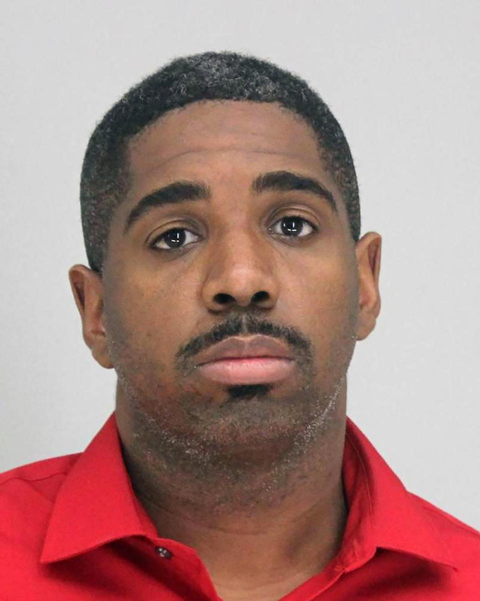 This photo provided by the Dallas County Sheriff's Office shows Bryan Riser. Authorities say Riser, a Dallas police officer, has been arrested on two counts of capital murder, more than a year and a half after a man told investigators that he kidnapped and killed two people at the officer’s instruction in 2017. (Dallas County Sheriff's Office via AP)