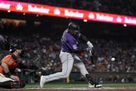 Colorado Rockies' Hunter Goodman hits a two-run triple against the San Francisco Giants during the second inning of a baseball game Friday, Sept. 8, 2023, in San Francisco. (AP Photo/Godofredo A. Vásquez)