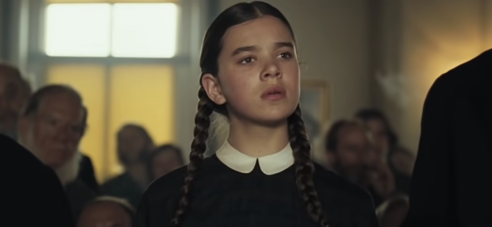 Hailee Steinfeld in True Grit, with plaits and dressed in old-timey clothes