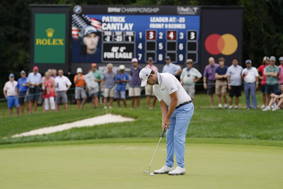 Patrick Cantlay putts on the forth green during the final round of the BMW Championship golf tournament, Sunday, Aug. 29, 2021, at Caves Valley Golf Club in Owings Mills, Md. (AP Photo/Julio Cortez)