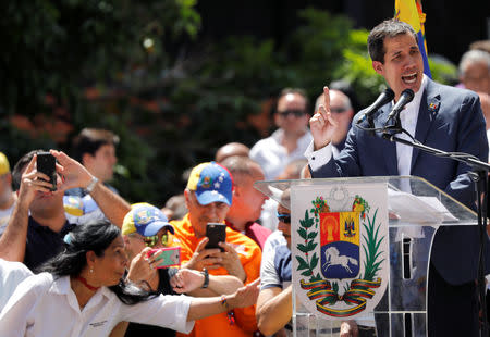 Venezuelan opposition leader Juan Guaido, who many nations have recognized as the country's rightful interim ruler, speaks as he attends a rally to commemorate the Day of the Youth and to protest against Venezuelan President Nicolas Maduro's government in Caracas, Venezuela February 12, 2019. REUTERS/Manaure Quintero