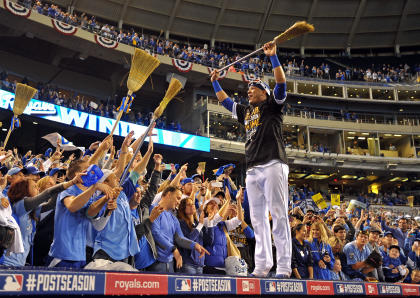 Royals catcher Salvador Perez celebrates with fans after beating the Angels to reach the ALCS. (USA Today)