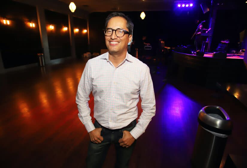 Frank Acevedo the owner of the Paramount Ballroom poses in the Paramount Ballroom In Boyle Heights on Friday, August 12, 2022. The iconic venue is one of the last surviving ballroom venue which features concerts from international touring bands to local rock artists. (Photo by James Carbone)