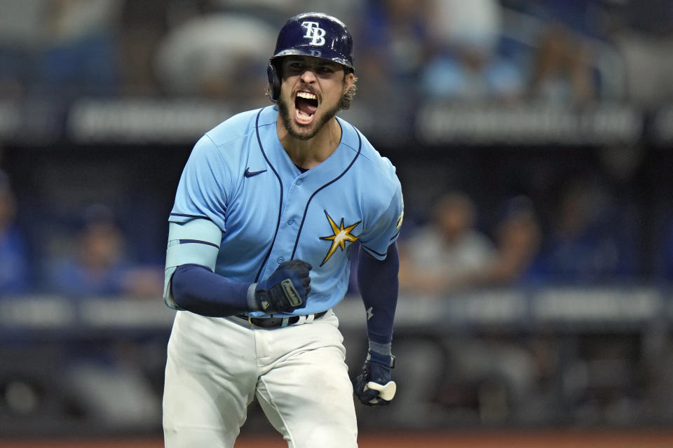 Tampa Bay Rays' Josh Lowe reacts after hitting a walk-off single off Toronto Blue Jays relief pitcher Jordan Romano during the ninth inning of a baseball game Saturday, Sept. 23, 2023, in St. Petersburg, Fla. (AP Photo/Chris O'Meara)