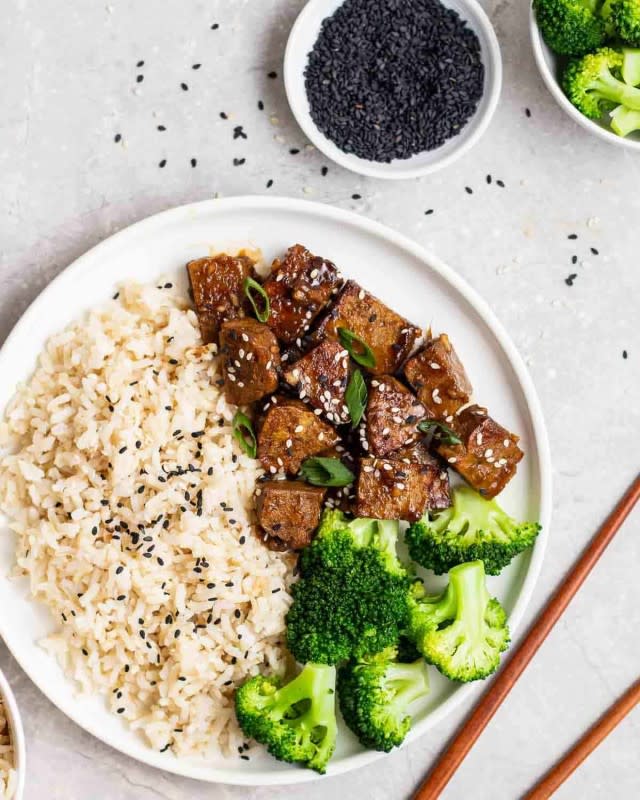 <p>My Plantiful Cooking</p><p>Featuring crispy pan-fried seitan chunks cooked in a rich teriyaki sauce, this vegan teriyaki chicken is better than takeout! Quick to make and ready in 15 minutes, teriyaki seitan makes a great weeknight dinner.</p><p><strong>Get the recipe: <a href="https://www.myplantifulcooking.com/vegan-seitan-teriyaki-chicken/" rel="nofollow noopener" target="_blank" data-ylk="slk:Vegan Seitan Teriyaki Chicken;elm:context_link;itc:0;sec:content-canvas" class="link rapid-noclick-resp">Vegan Seitan Teriyaki Chicken</a></strong></p>