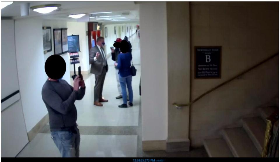 Members of the tour led by Representative Loudermilk  took photos and videos of the tunnel leadingfrom the Rayburn House Office Building to the Capitol on January 5, 2021