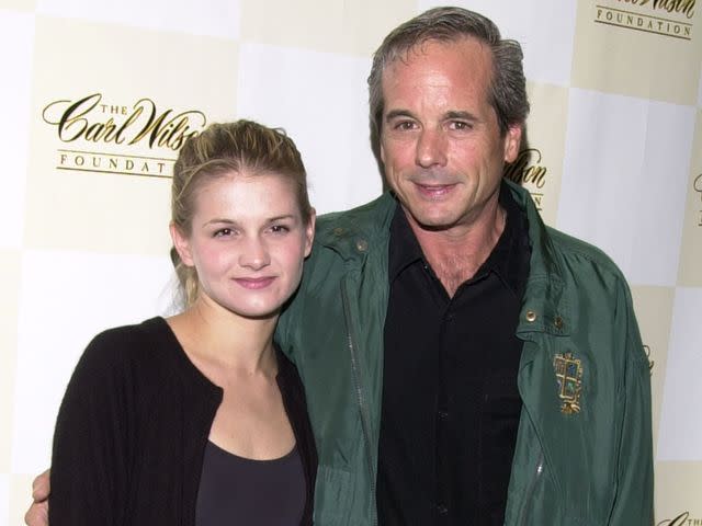 <p>Sebastian Artz/Getty</p> Desi Arnaz Jr. and his daughter Haley arrive at the Carl Wilson benefit concert October 14, 2001.