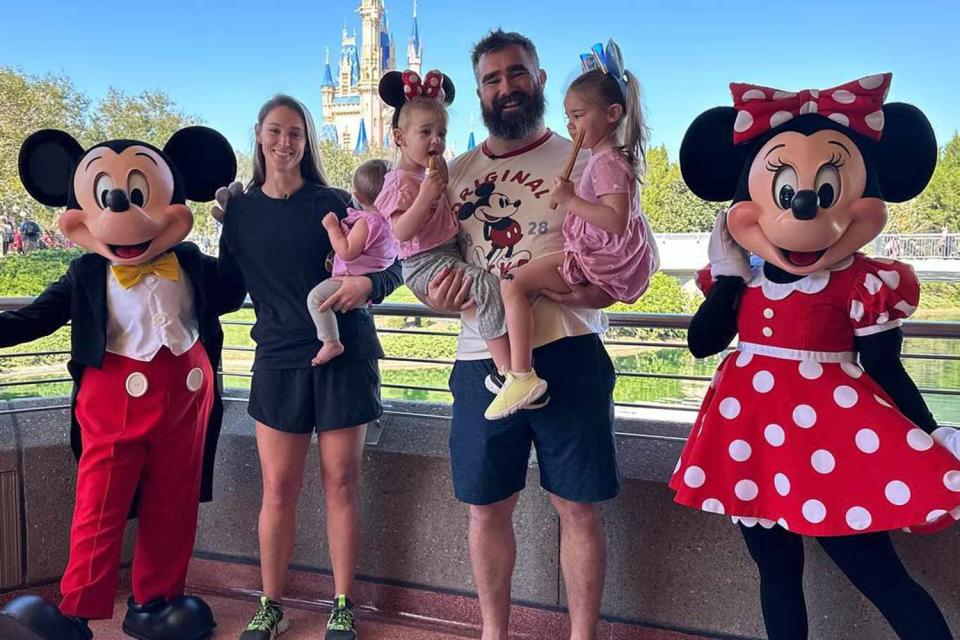 <p>Disney Parks/Instagram</p> Jason and Kylie Kelce with their three daughters at Disney World