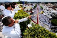 <p>Faithful take part in the 2018 annual Holy Convocation of ‘La Luz del Mundo’ (The Light of the World) church on August 14, 2018, in Guadalajara, Jalisco state, Mexico, where its headquarters are located. (Photo by ULISES RUIZ/AFP/Getty Images) </p>