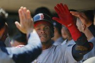 Boston Red Sox's Ceddanne Rafaela celebrates his two-run home run against the Minnesota Twins in the fifth inning of a baseball game, Sunday, May 5, 2024, in Minneapolis. (AP Photo/Bruce Kluckhohn)