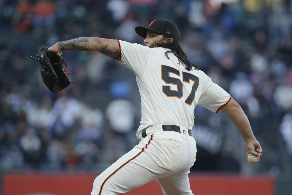 San Francisco Giants starting pitcher Dereck Rodriguez works in the first inning of a baseball game against the Houston Astros Monday, Aug. 6, 2018, in San Francisco. (AP Photo/Eric Risberg)