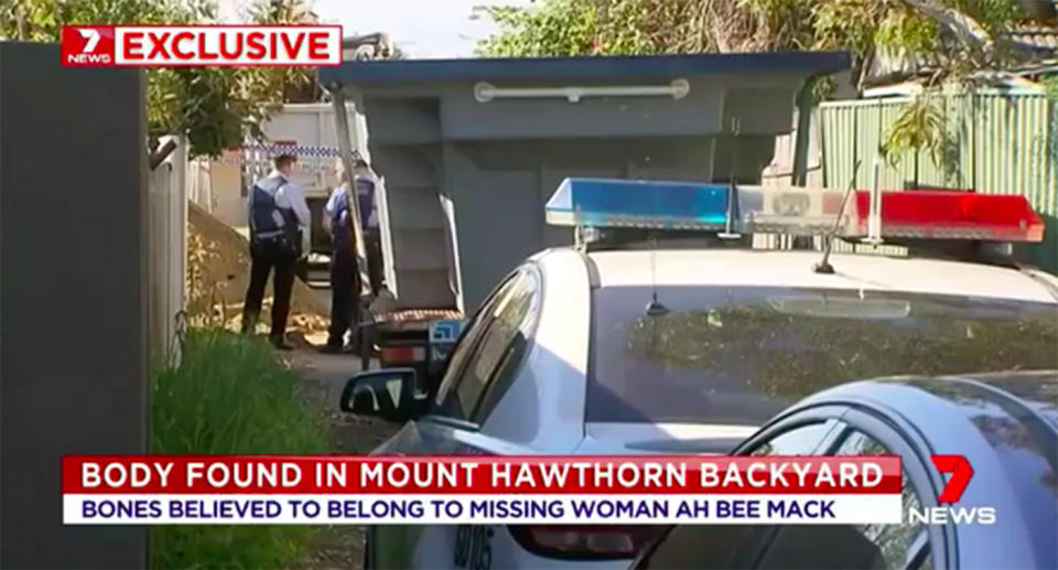 Police attend the Fairfield Street home in Mount Hawthorn after Ah Bee Mack's bones were found in the backyard.