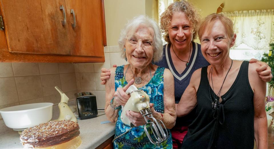 Arlene McCardle, 90, gathered with daughters Kristine McCardle, 56, center, and Marybeth McCardle, 61, to make her winning cake recipe in the family home on the far north side.
