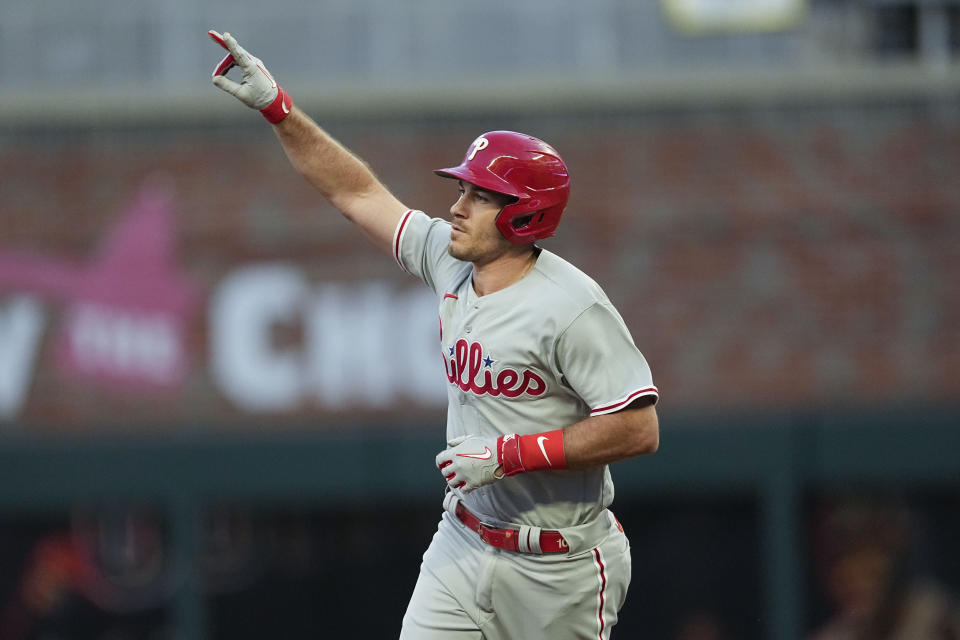 Philadelphia Phillies' J.T. Realmuto (10) runs the bases after his two-run homer in the third inning of Game 2 of a baseball NL Division Series against the Atlanta Braves, Monday, Oct. 9, 2023, in Atlanta. (AP Photo/John Bazemore)