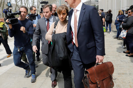 Actress Allison Mack departs the Brooklyn Federal Courthouse after facing charges regarding sex trafficking and racketeering related to the Nxivm cult case in New York, U.S., April 8, 2019. REUTERS/Shannon Stapleton