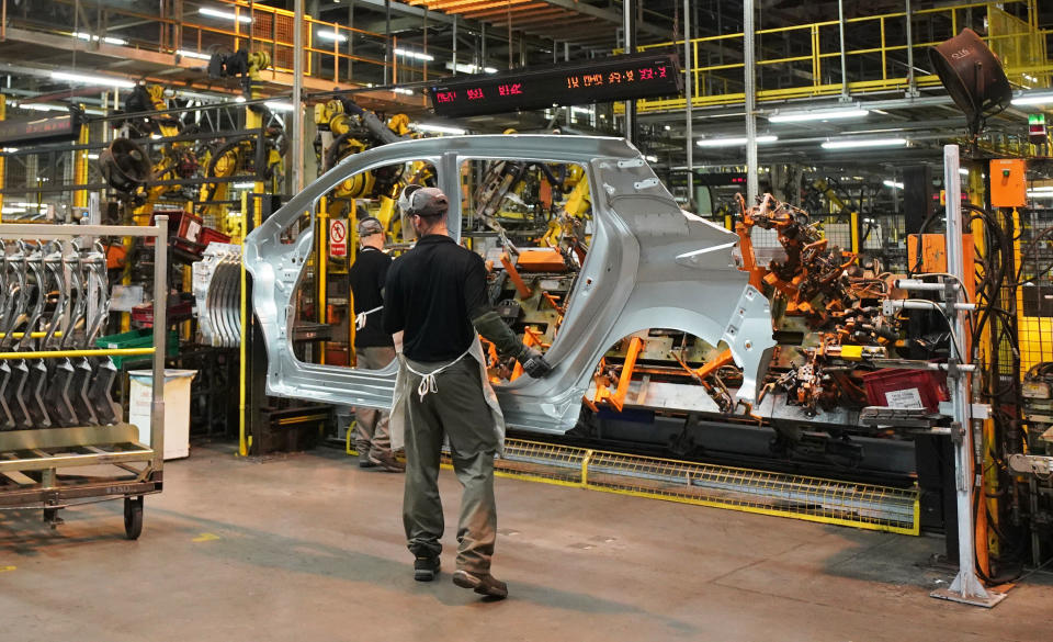 File photo dated 10/10/19 of workers on the production line at Nissan's factory in Sunderland. The number of cars built in the UK has fallen for the 18th month in a row, showing the ongoing impact of the coronavirus crisis on the industry, figures show. Issue date: Friday March 26, 2021.