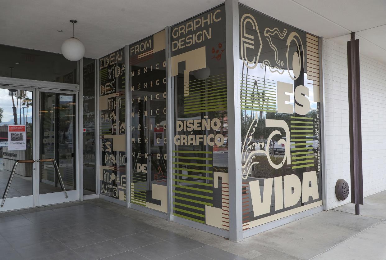 The window at the he Palm Springs Art Museum Architecture and Design Center is decorated for the upcoming ÒEso es la vidaÓ graphic design exhibition in Palm Springs, Calif., August 9, 2022. 