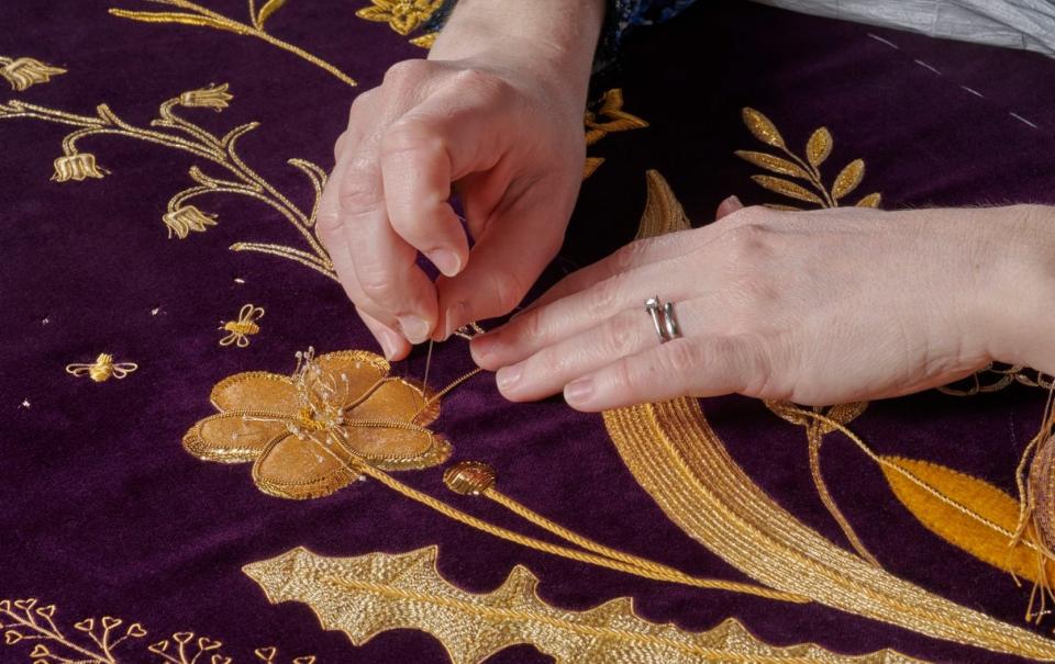 The Queen’s robe also features national emblems such as the rose, thistle and shamrock - Royal School of Needlework