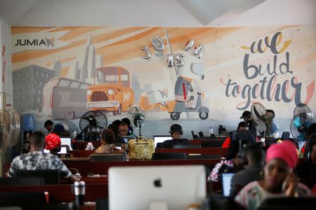 People work on computers at the online store Jumia in Ikeja district, in Nigeria's commercial capital Lagos June 10, 2016.REUTERS/Akintunde Akinleye