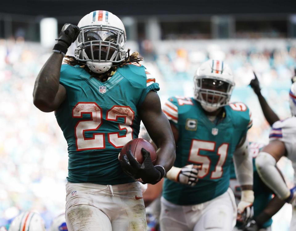 The Dolphins' Jay Ajayi had plenty to celebrate on Sunday (AP)