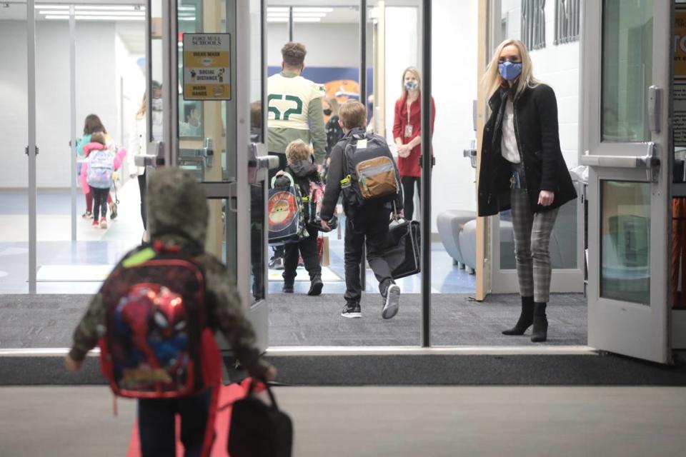 In this file photo, River Trail Elementary School students enter the school in Fort Mill. The school district has plans in its budget to increase starting teacher pay to $50,000 beginning this fall.