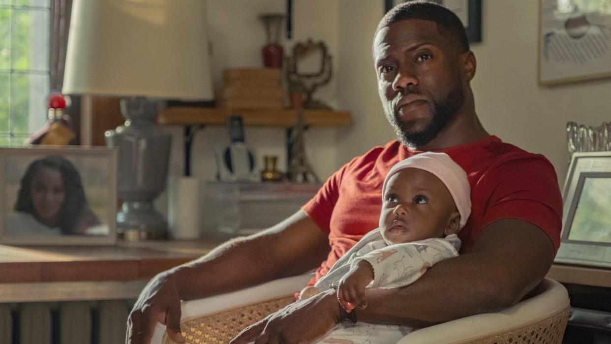 kevin hart holds a baby in a scene from fatherhood, a good housekeeping pick for best sad movies on netflix