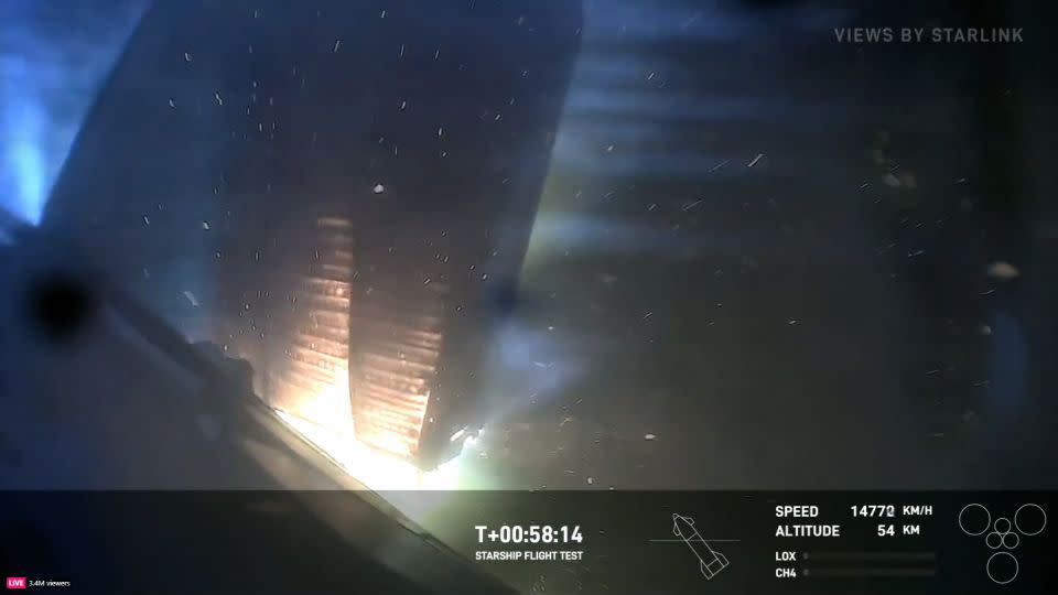 A flap near the camera view on Starship appeared to scorch and barely hang on as the vehicle approached splashdown. - SpaceX