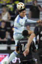 CF Montréal defender Fernando Álvarez, left, heads the ball over Nashville SC midfielder Dru Yearwood (16) during the first half of an MLS playoff soccer match Saturday, May 4, 2024, in Nashville, Tenn. (AP Photo/George Walker IV)