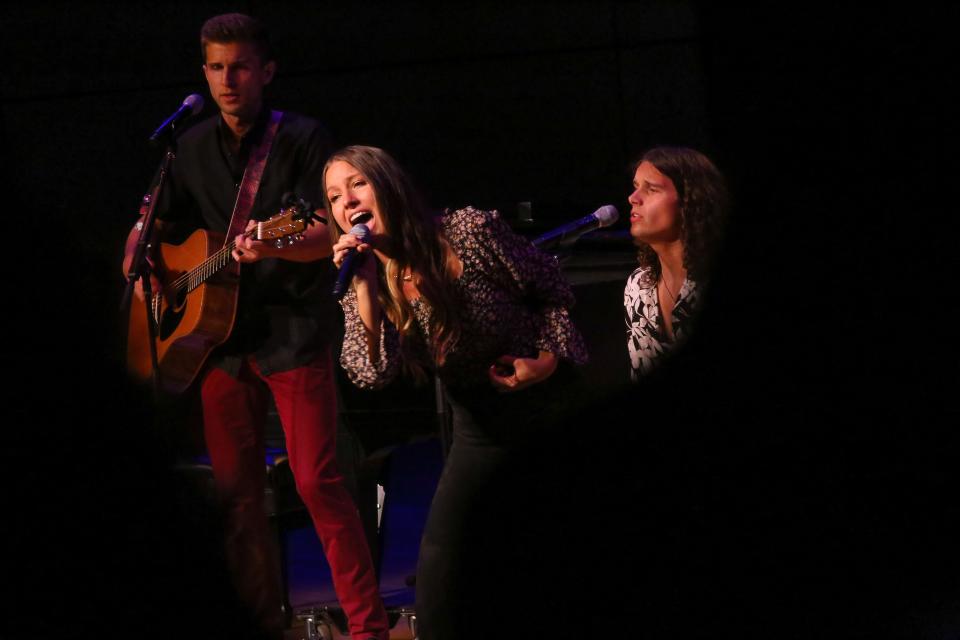 Girl Named Tom — Caleb, left, Bekah and Joshua Liechty — performs Oct. 1, 2021, at Goshen College's Sauder Concert Hall. The Ohio-raised, South Bend-based trio advanced Nov. 16, 2021, to the final 11 on "The Voice."