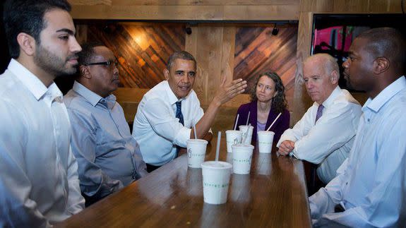 President Barack Obama and Vice President Joe Biden meeting with, from left, Aidin Sarabi, Abdullahi Mohamed, Meredith Upchurch and Antonio Byrd at a Shake Shack in Washington, Friday, May 16, 2014.