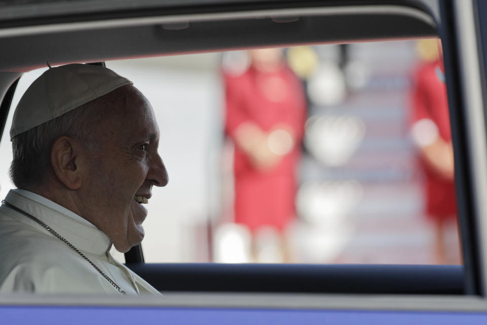 Pope Francis sits in a car as he arrived at Dublin international airport, Ireland, Saturday, Aug. 25, 2018. Pope Francis is on a two-day visit to Ireland. (AP Photo/Gregorio Borgia)