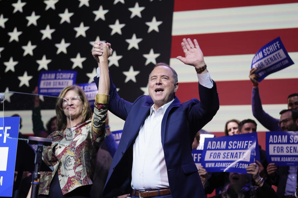 U.S. Rep. Adam Schiff, D-Calif., a U.S. Senate candidate, waves at supporters next to his wife Eve at an election night party, Tuesday, March 5, 2024, in Los Angeles. (AP Photo/Jae C. Hong)