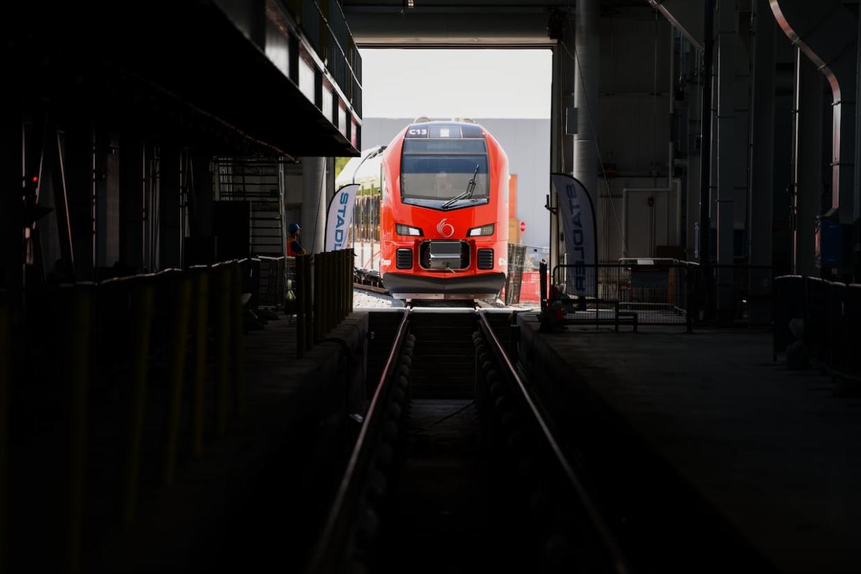 Many residents are once again feeling left in the dark thanks to the secrecy surrounding Ottawa's latest LRT settlement talks. (Spencer Colby/The Canadian Press - image credit)