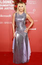 <p>The fashion icon channeled 2000s fashion in a purple metallic dress and a pinned half-up 'do. </p>