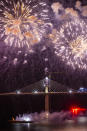 Fireworks light up the skies at the construction site of the Peljesac Bridge in Komarna, Croatia, Thursday, July 29, 2021. European Union-funded Peljesac Bridge in southern Croatia that has been built by a Chinese state-owned company was opened late Wednesday. The bridge was designed to connect two swaths of Adriatic Sea coastline and passes over a small stretch of Bosnia's territory. (AP Photo)