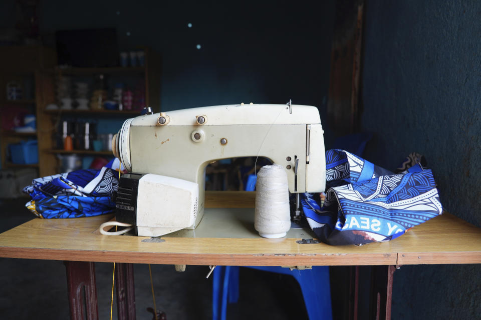 Carole's sewing machine sits idle in her home in Bouar, Central African Republic, Thursday, March 7, 2024. A former combatant, the 32-year-old received it after her training course when she left the rebel group. Nearly 5,000 fighters have put down their arms in Central African Republic since a disarmament program launched nearly a decade ago. Yet former rebels, communities and conflict experts say it's hard to halt fighting in a country still in conflict and where little other paid work exists. (AP Photo/Sam Mednick)