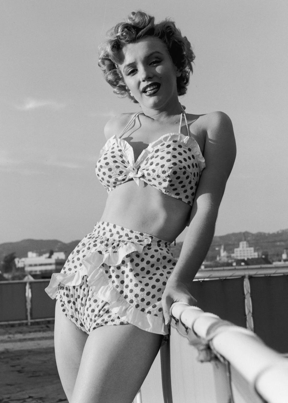 Marilyn Monroe (1926 - 1962) wearing a polka dot bikini, circa 1951