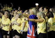 Australian fans spell out the word G'Day on Clapham Common in London, Wednesday, July 25, 2012. The fans attempted to break the Guinness World record for The Most People Wearing The Same Full Team Kit.