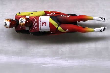 Luge - Pyeongchang 2018 Winter Olympics - Men's Doubles Competition - Olympic Sliding Centre - Pyeongchang, South Korea - February 14, 2018. Tobias Wendl and Tobias Arlt of Germany in action. REUTERS/Arnd Wiegmann