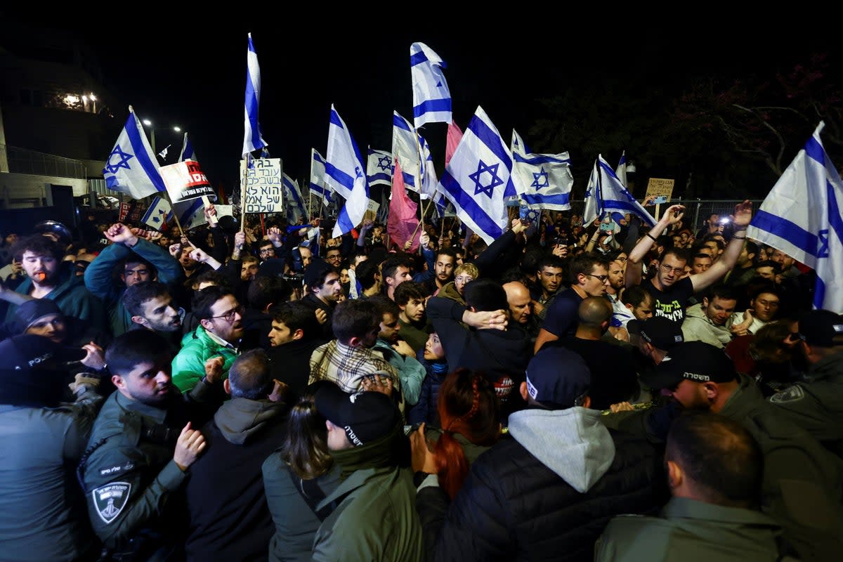 Protest against Israel's judicial overhaul and dismissing of the defense minister, in Jerusalem (REUTERS)