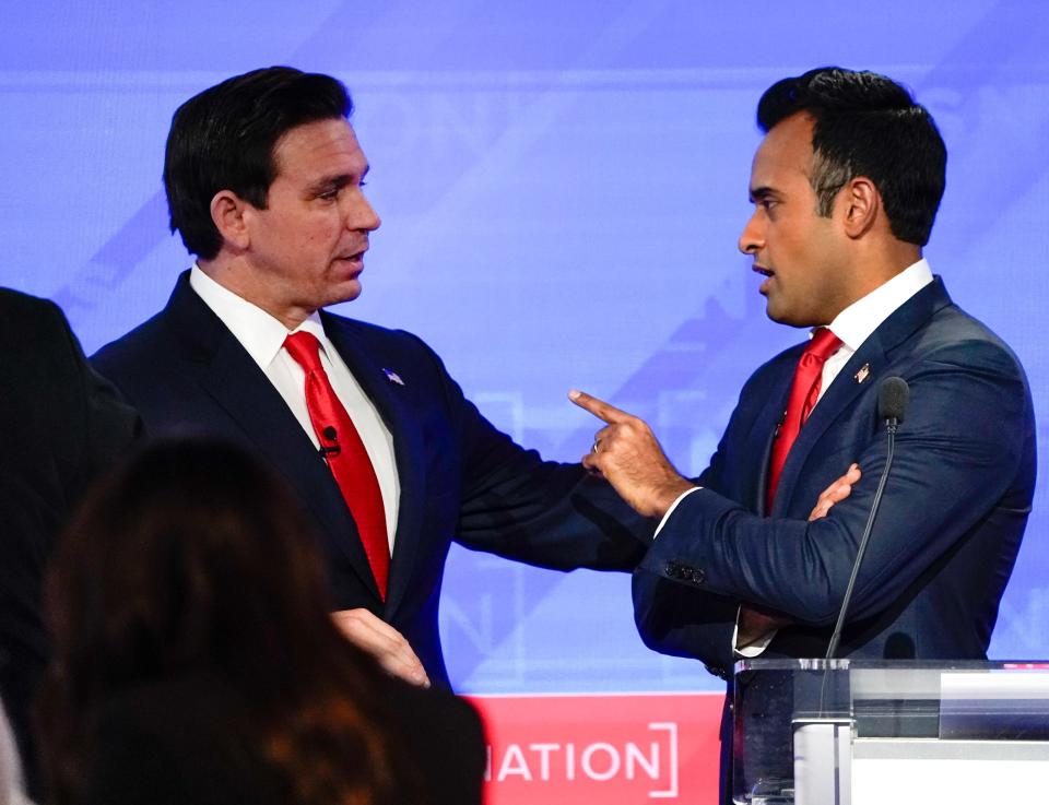 Florida Gov. Ron DeSantis and businessperson Vivek Ramaswamy during a break in the fourth Republican presidential primary debate at the University of Alabama.
