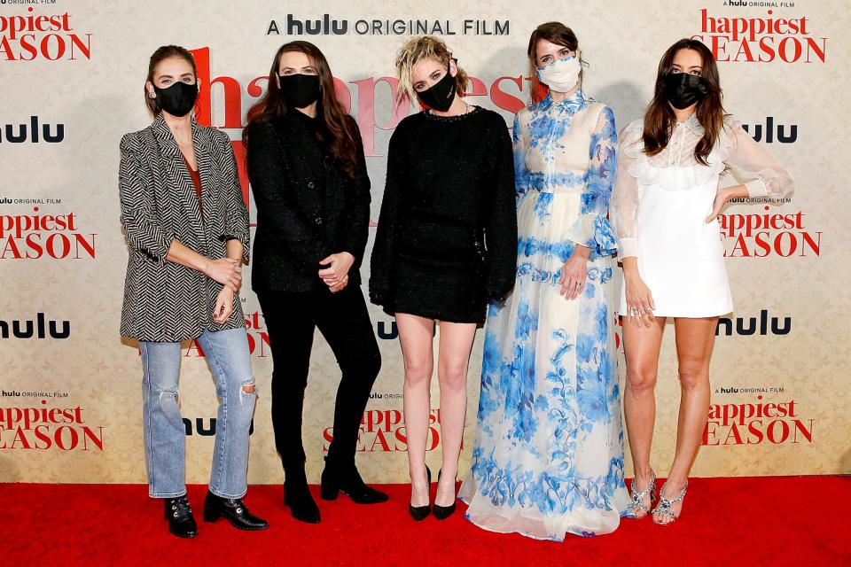 <p>Costars Alison Brie, Clea DuVall, Kristen Stewart, Mary Holland and Aubrey Plaza hit the red carpet in face masks for the socially distanced drive-in premiere of Hulu’s<i> Happiest Season </i>on Tuesday in L.A. </p>