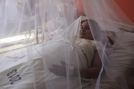 Pregnant women are covered with mosquito nets at the Women National Hospital in an effort to prevent being bitten by mosquitoes that might carry Zika, Dengue and Chikungunya viruses, in San Salvador, El Salvador February 5, 2016. REUTERS/Jose Cabezas