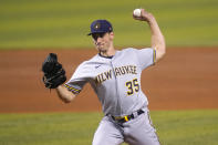 Milwaukee Brewers starting pitcher Brent Suter throws during the first inning of the team's baseball game against the Miami Marlins, Friday, May 7, 2021, in Miami. (AP Photo/Lynne Sladky)