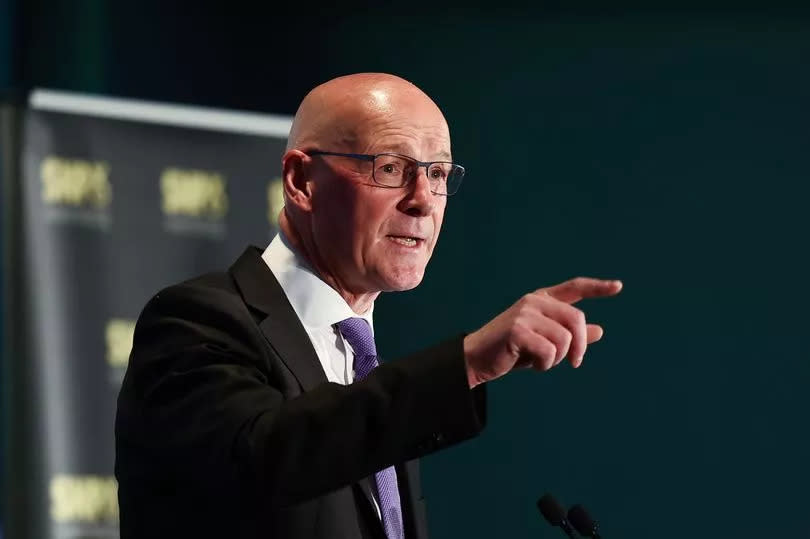 GLASGOW, SCOTLAND - JUNE 02: SNP Leader John Swinney addresses the launch of the SNP general election campaign with SNP Westminster candidates and activists on June 02, 2024 in Glasgow, Scotland. SNP leader John Swinney was joined by the party's Westminster candidates and activists. Also in attendance were SNP Westminster Leader Stephen Flynn, Cabinet Secretary for Net-Zero MÃ iri McAllan, Campaign Director Stewart Hosie. (Photo by Jeff J Mitchell/Getty Images)